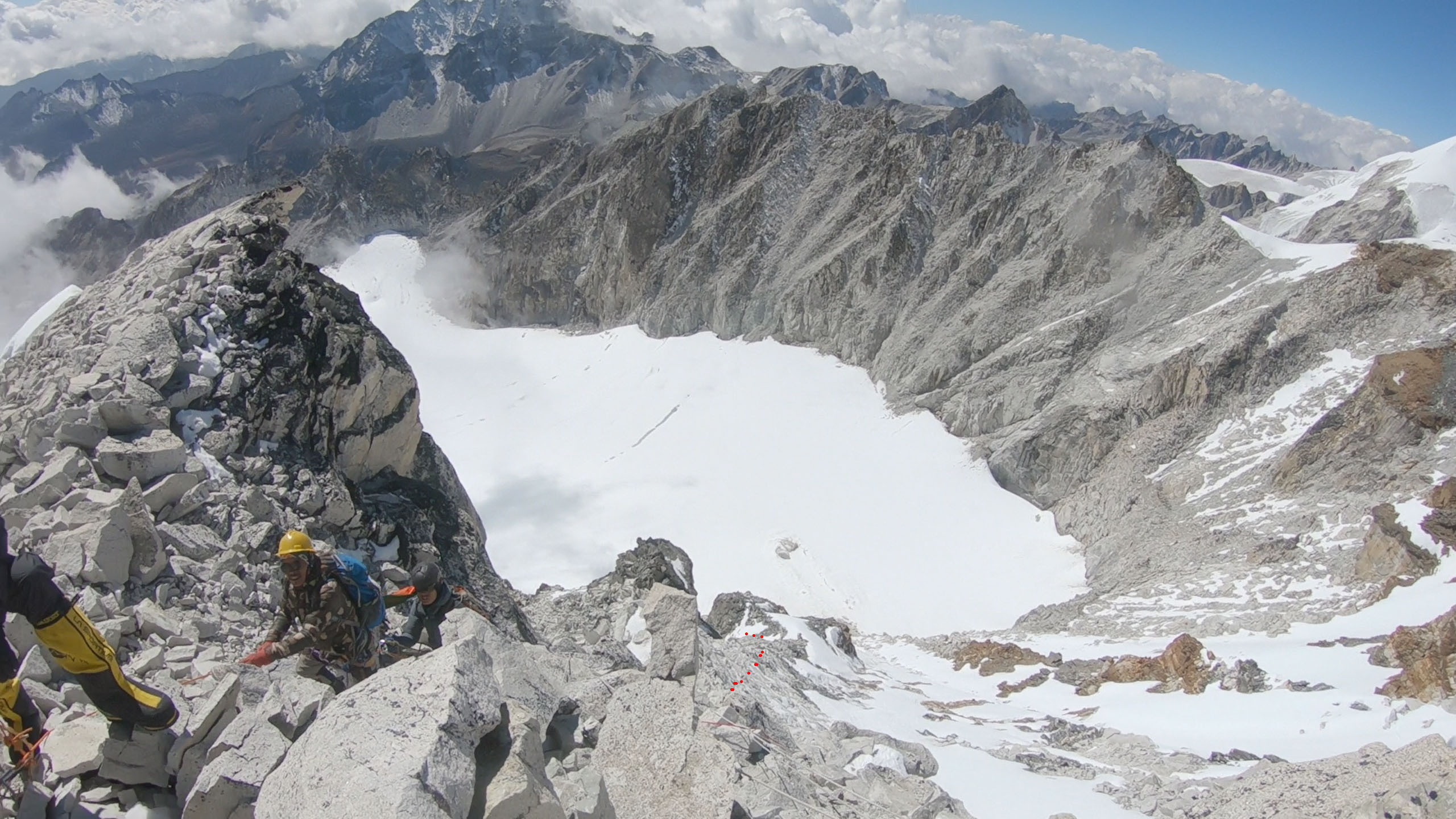 On the steep wall which goes all the way straight down to glacier 